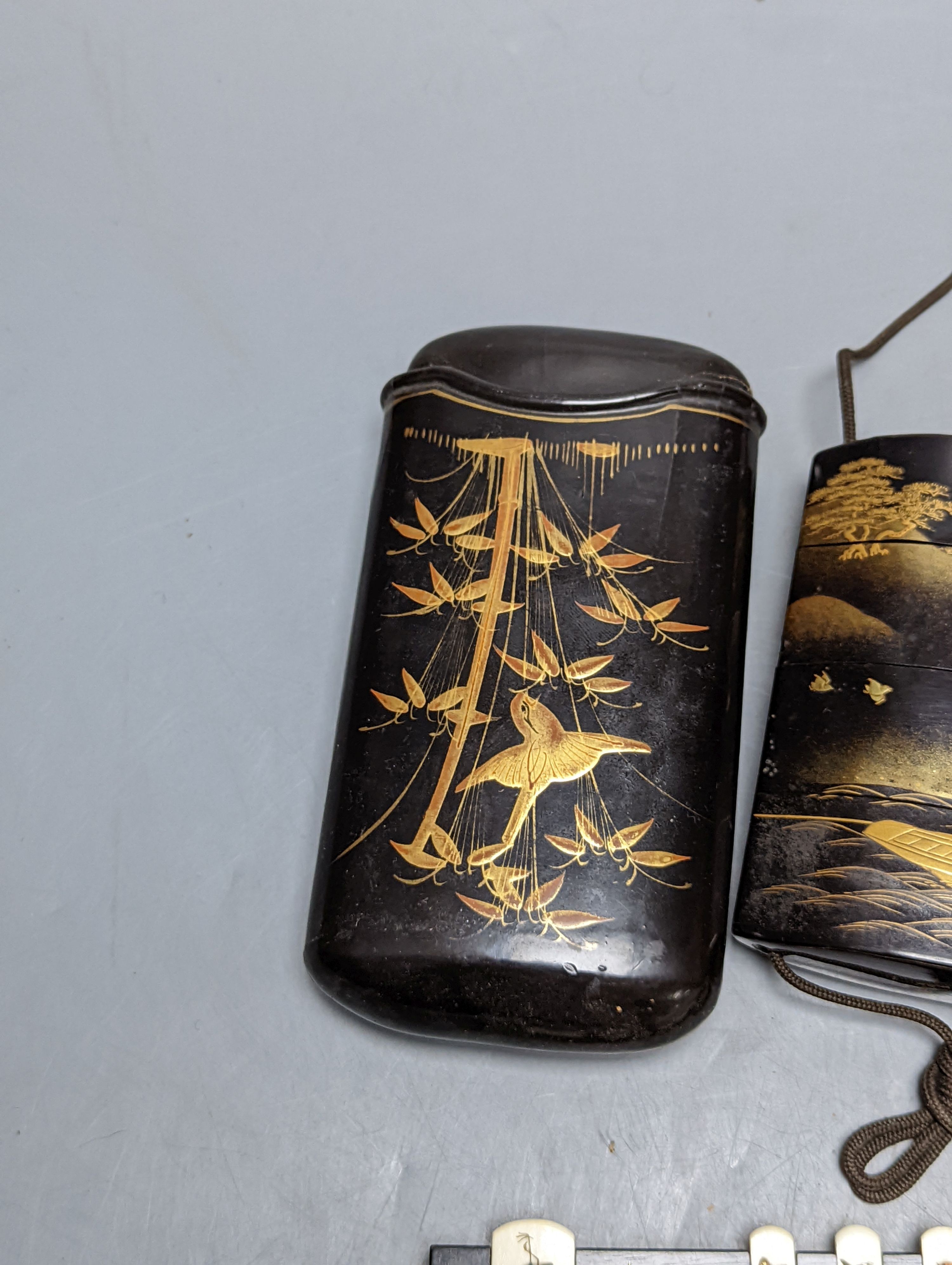 A 19th century Japanese lacquer inro, similar cigar case, two bezique markers and a birch bark case, 9 cams high.
